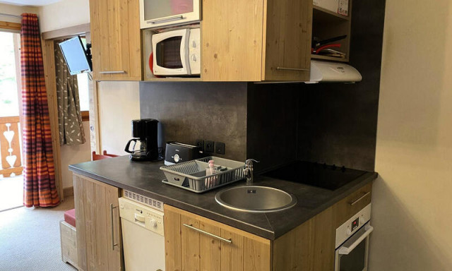 _ws-photos_FRANCE_risoul_residences_residence-antares-maeva-home_appartement-au-pieds-des-pistes-vue-montagne-coin-cabine-2-pieces-6-personnes-confort_3_2800283